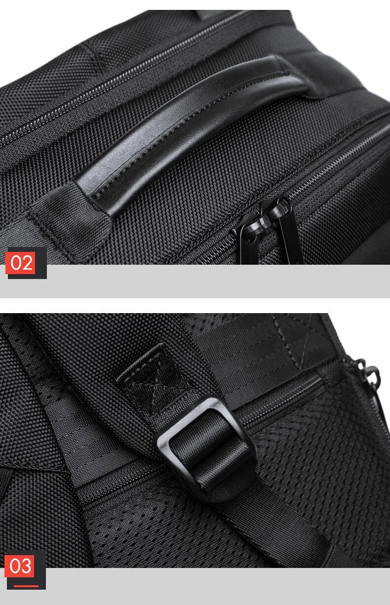 Close-up of a black backpack with zippers and a buckle on a gray background.