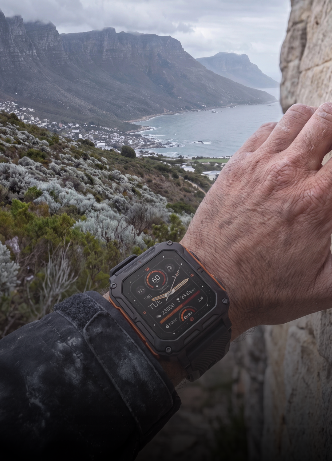 AEGA Nomad rugged rectangular smart watch worn on the wrist outdoors on the Cape coast
